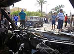 Bombings in Iraq Kill 14