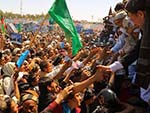 Abdullah Vows Peace in First Runoff Rally