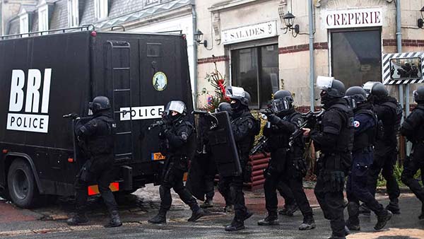 Gunmen killed as twin sieges rock France