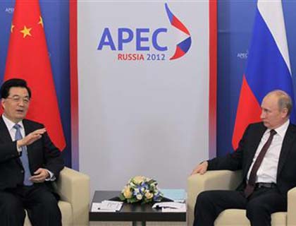 China, Russia Sound Alarm on World Economy at APEC Summit